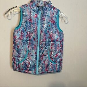 Spyder brand, girls pink and blue puffer vest 
size 6 zipper front lightweight.